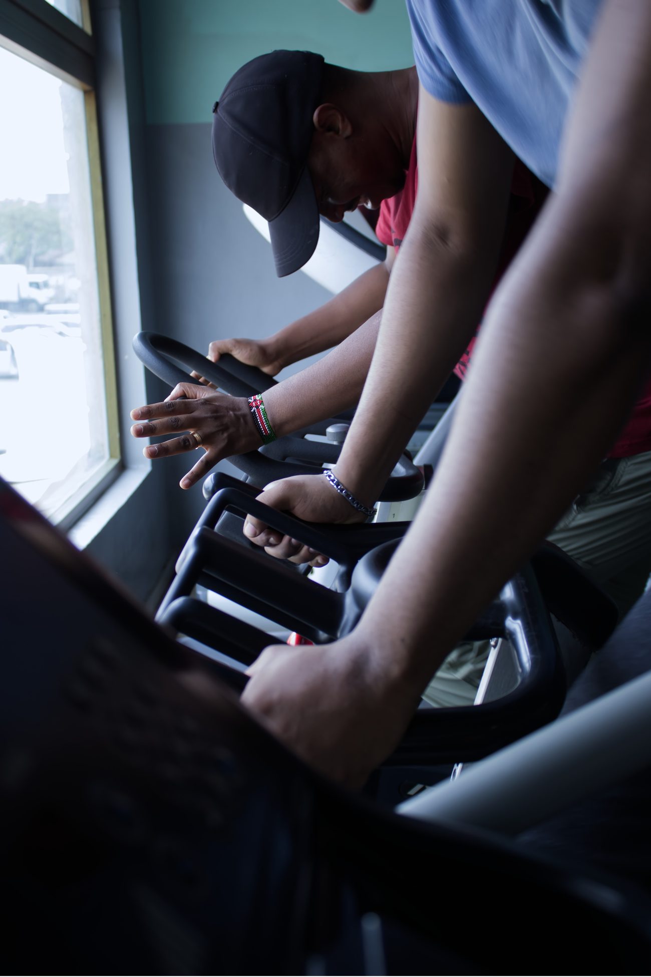 Members on exercise bikes